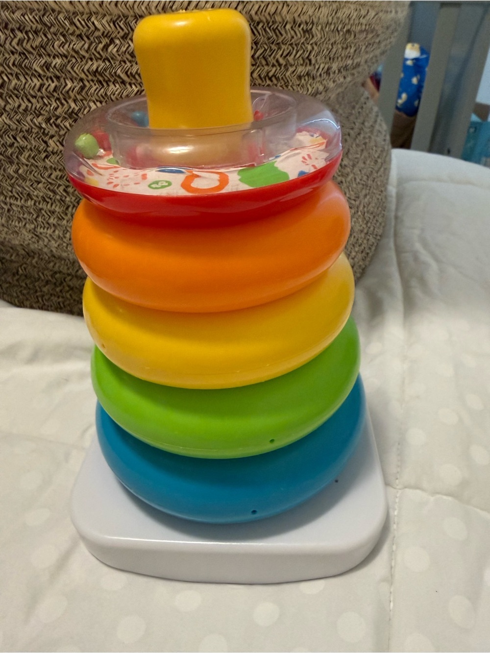 Fisher-Price Rainbow Stack & Spin Ring Toy in Red, Orange, Yellow, Green & Blue